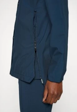 VAUDE Womens Mineo Jacket - Soft Shell Jacket - Dark Sea 14 VAUDE Womens Mineo Jacket - Soft Shell Jacket - Dark Sea -Vaude 82af7bd41aa24a5aaf4c8055296cf6d2